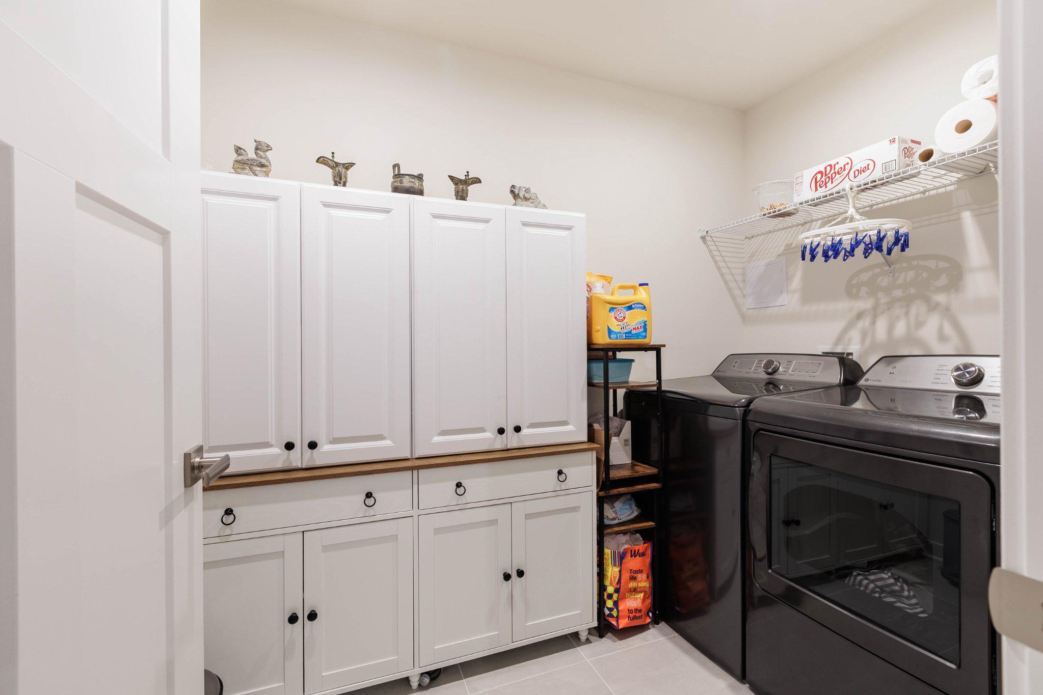 360 Shortleaf Circle Frederick, MD 21702 - Photo 19 of 49 Laundry room with storage.