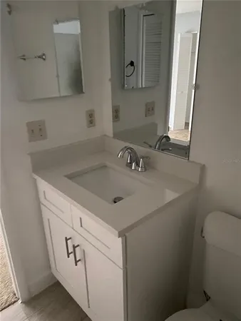 a bathroom with a sink and a toilet