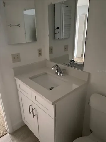 a bathroom with a sink and a toilet