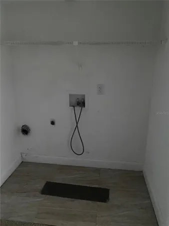 a view of a room with racks on the wall