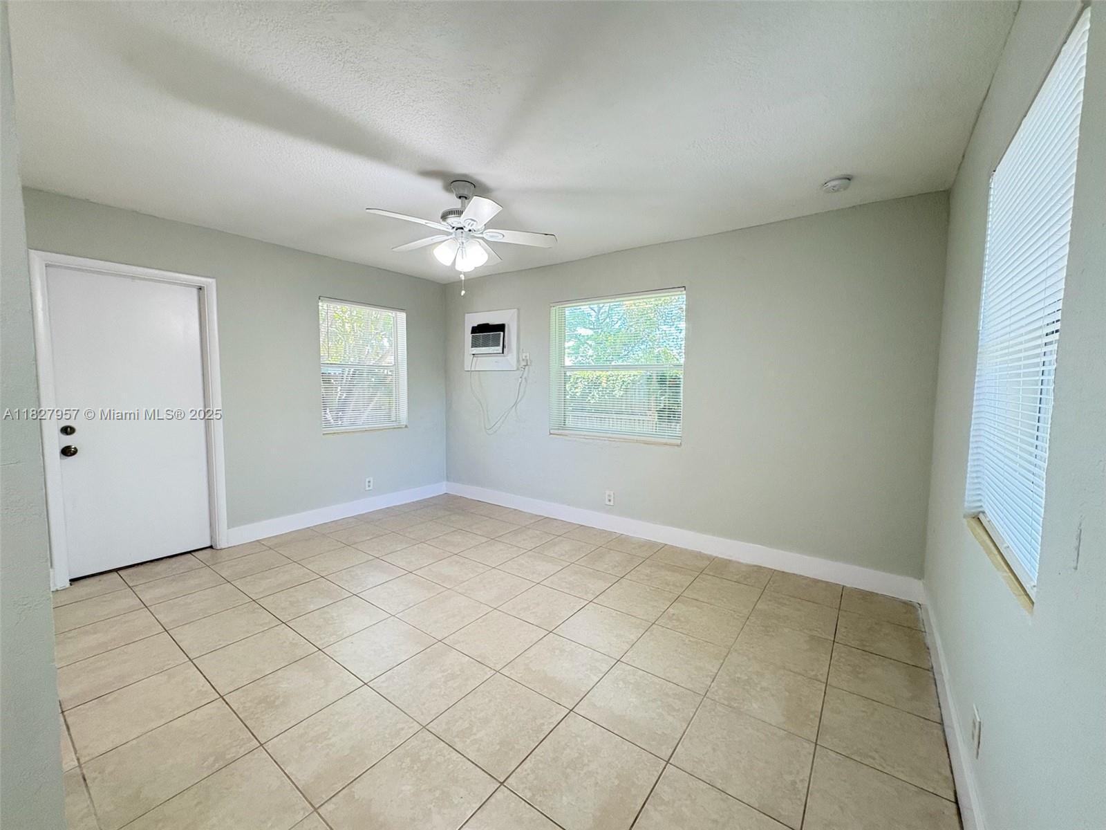 2840 Funston Street, Unit B Hollywood, FL 33020 - Photo 6 of 10 a view of an empty room with a window