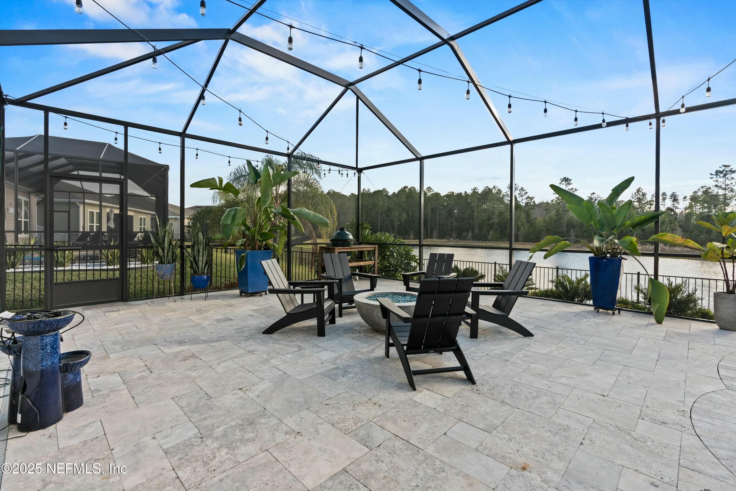 66 Silver Reef Lane St. Augustine, FL 32095 - Photo 21 of 46 a view of a couches in backyard of house