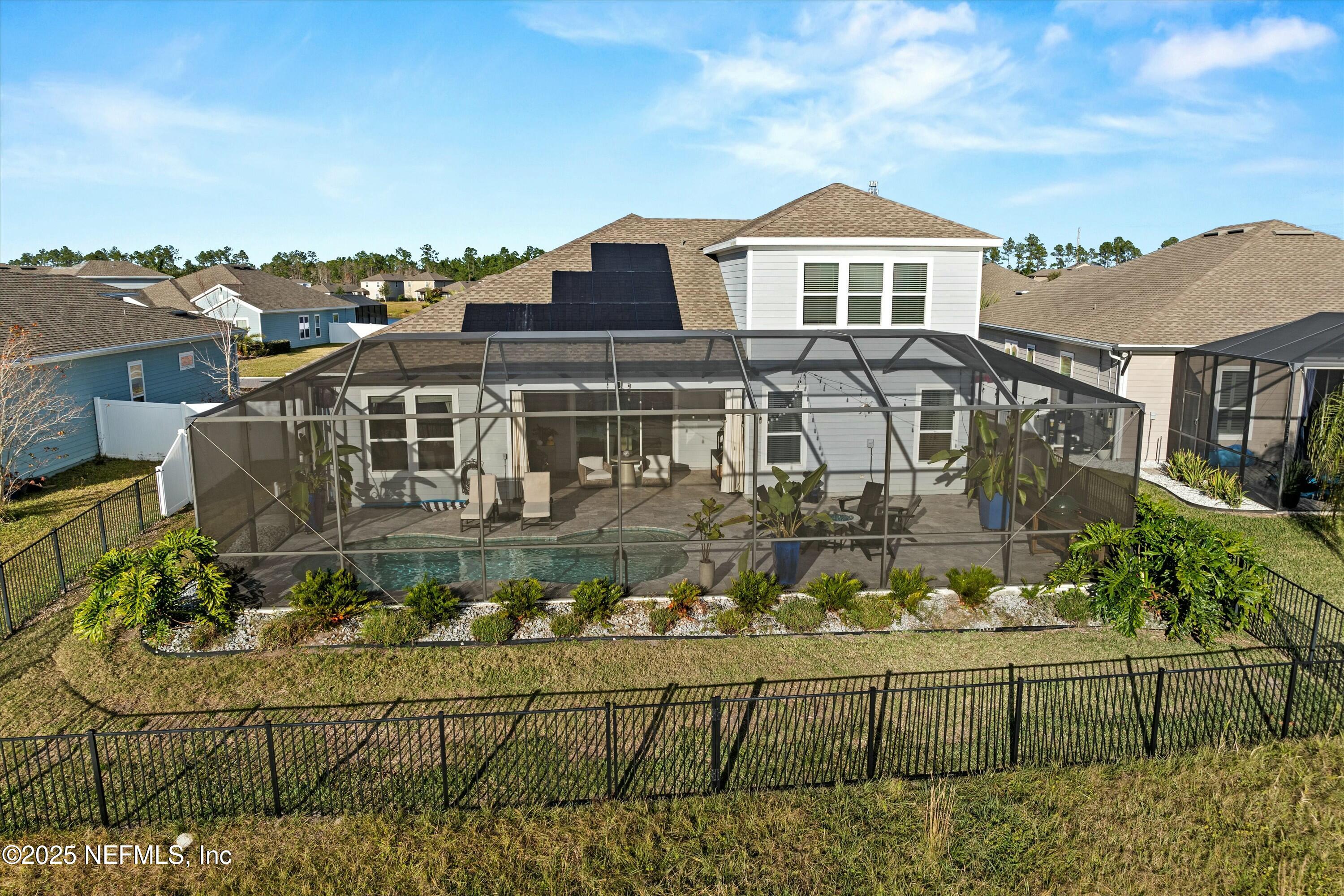 66 Silver Reef Lane St. Augustine, FL 32095 - Photo 23 of 46 a front view of a house with a yard