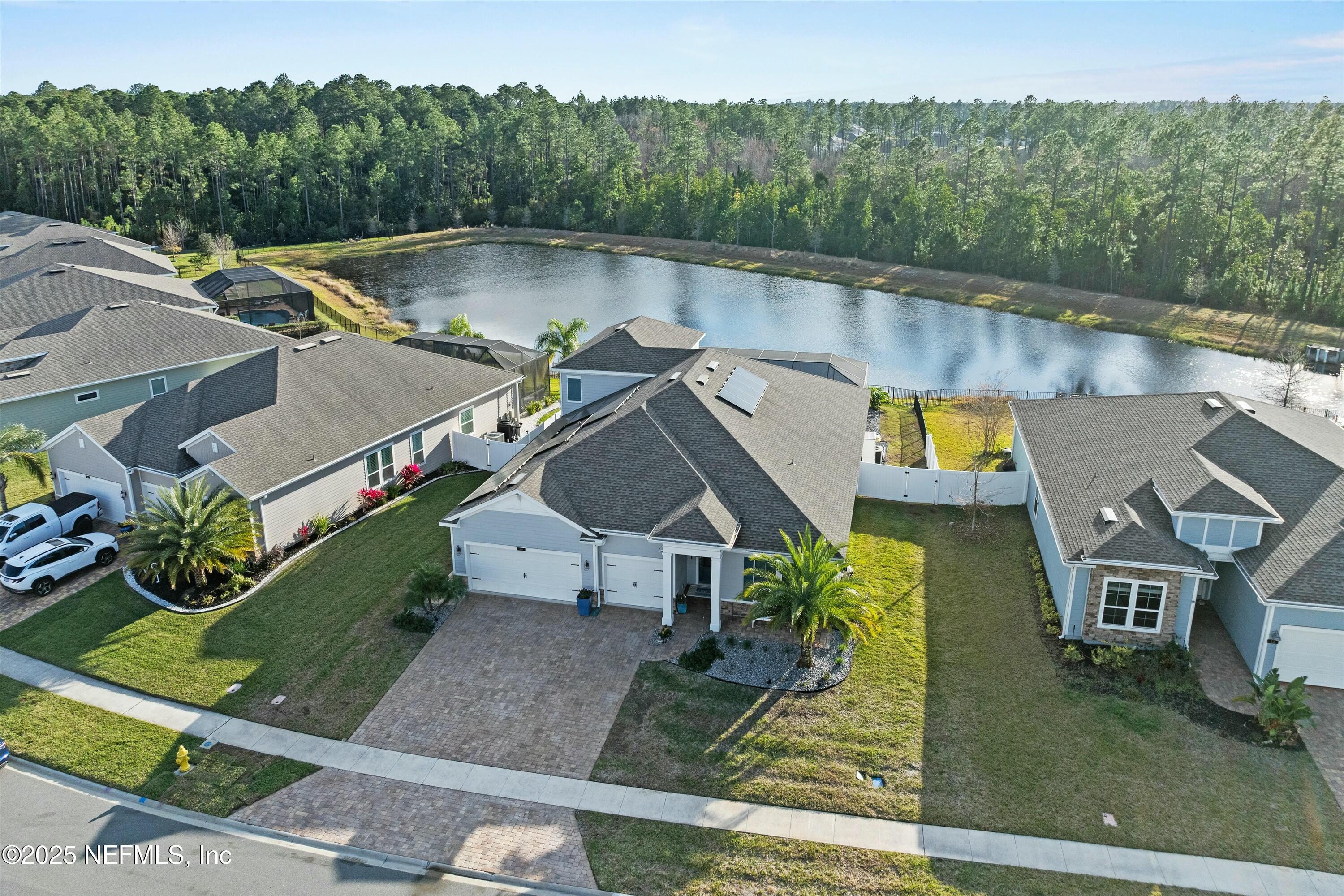 66 Silver Reef Lane St. Augustine, FL 32095 - Photo 3 of 46 an aerial view of a house having yard