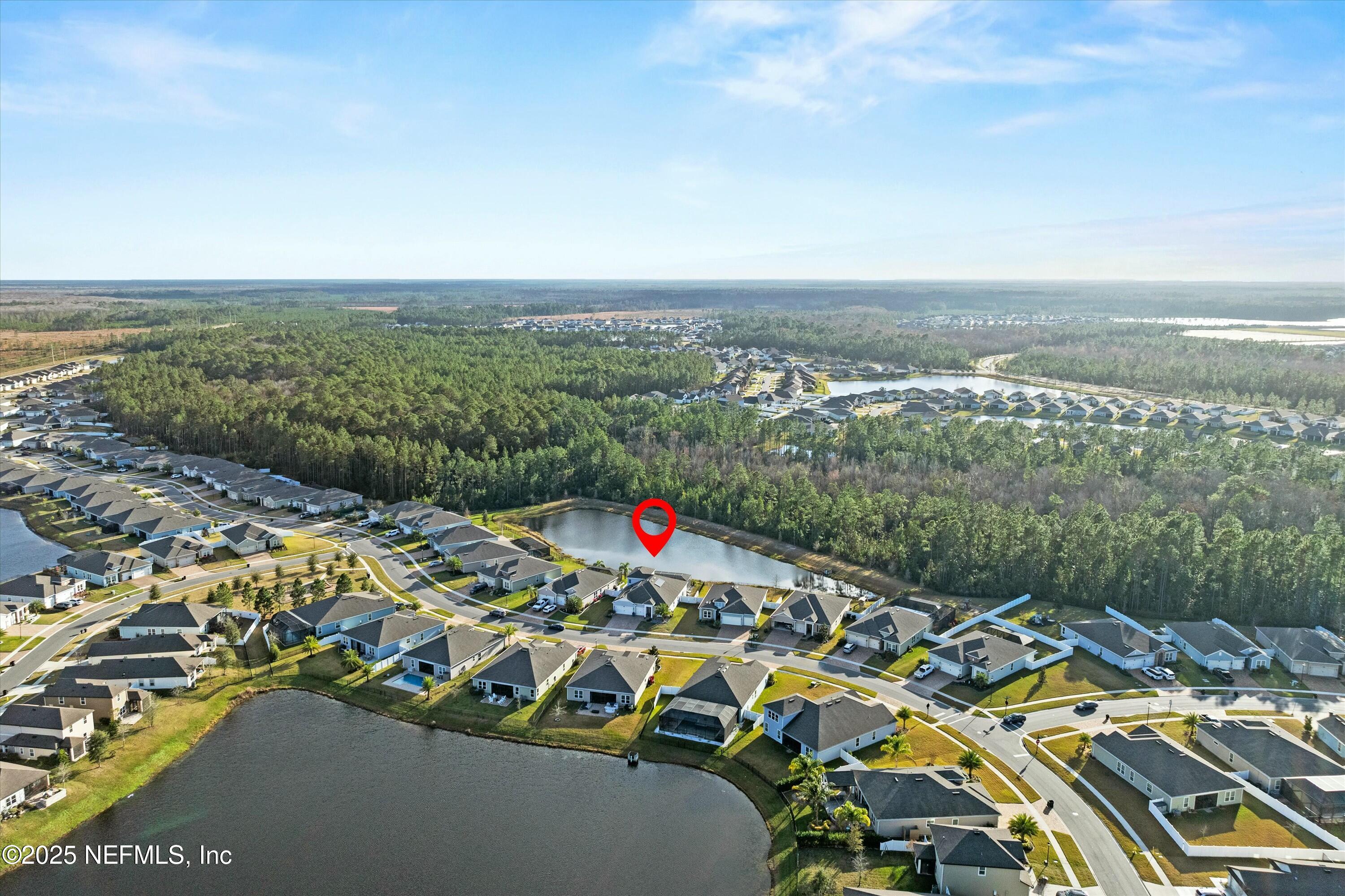 66 Silver Reef Lane St. Augustine, FL 32095 - Photo 46 of 46 an aerial view of a city