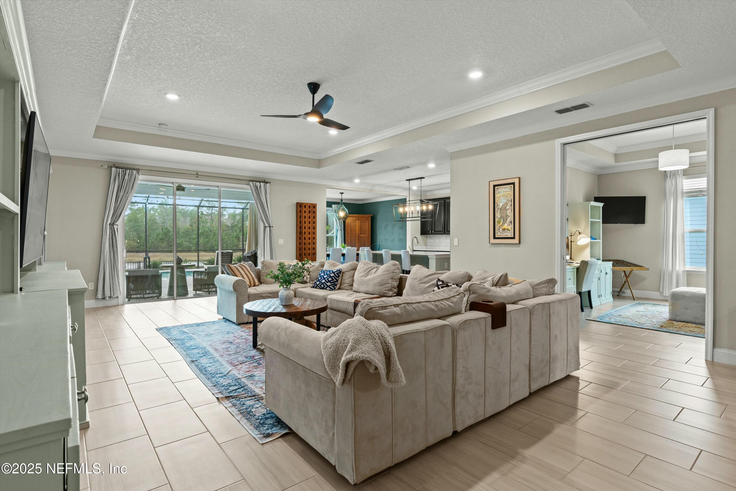 66 Silver Reef Lane St. Augustine, FL 32095 - Photo 6 of 46 a living room with furniture