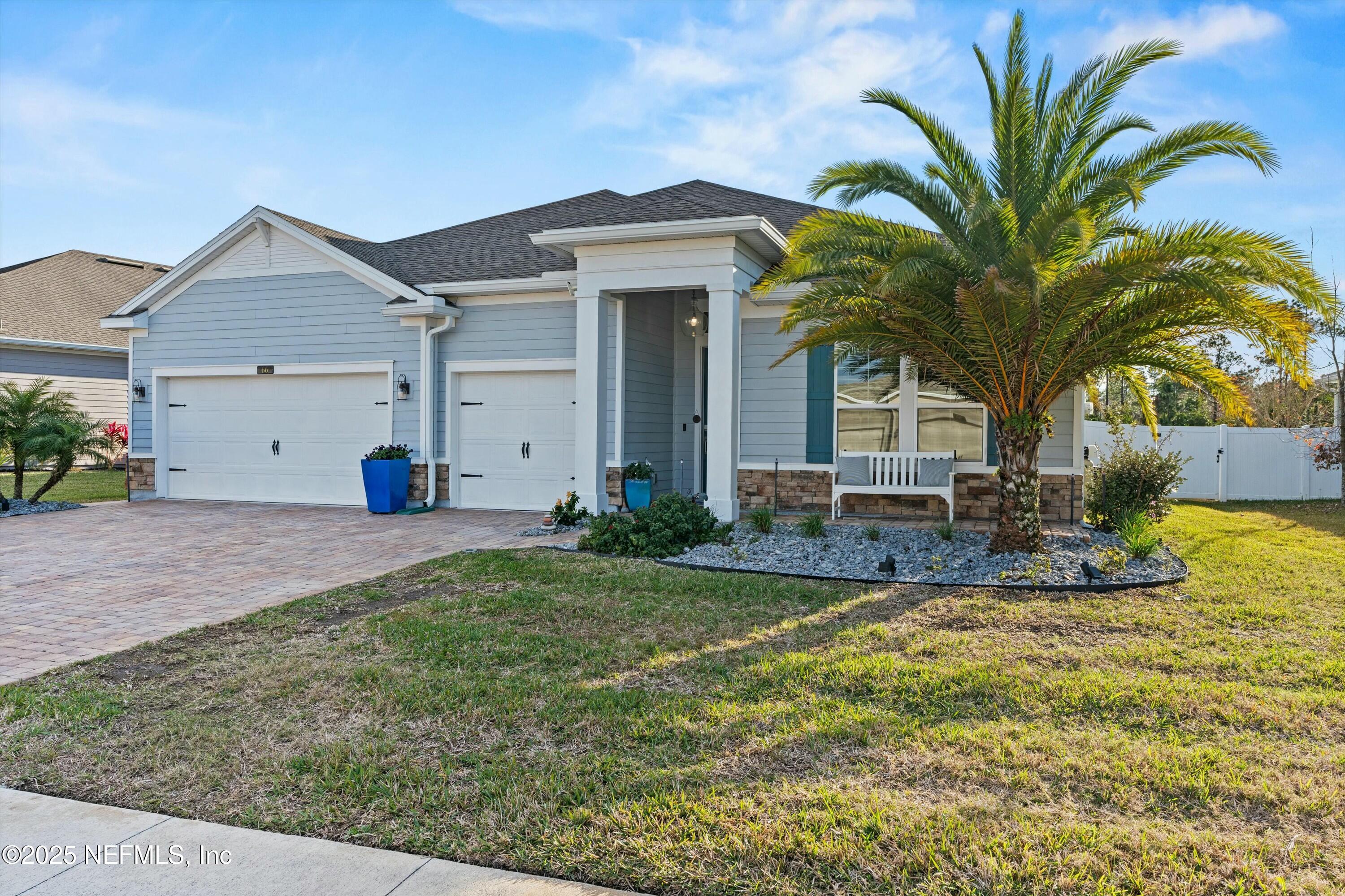 66 Silver Reef Lane St. Augustine, FL 32095 - Photo 9 of 46 a view of a house with a yard