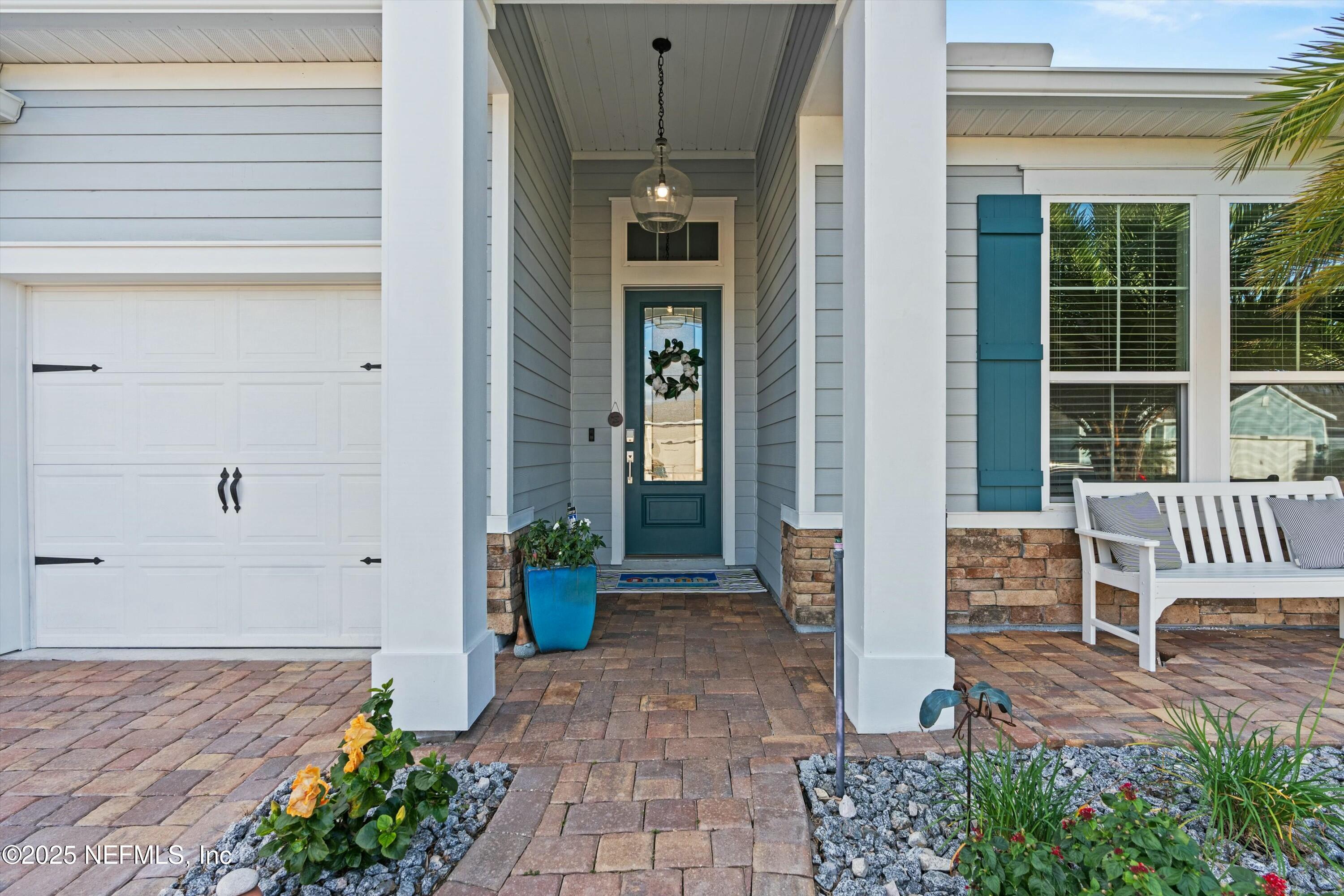 66 Silver Reef Lane St. Augustine, FL 32095 - Photo 10 of 46 a view of an entryway with table and chair
