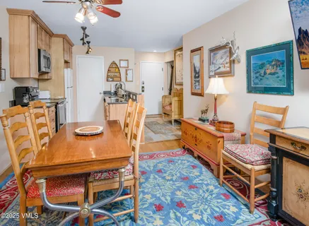 a bed room with furniture and wooden floor