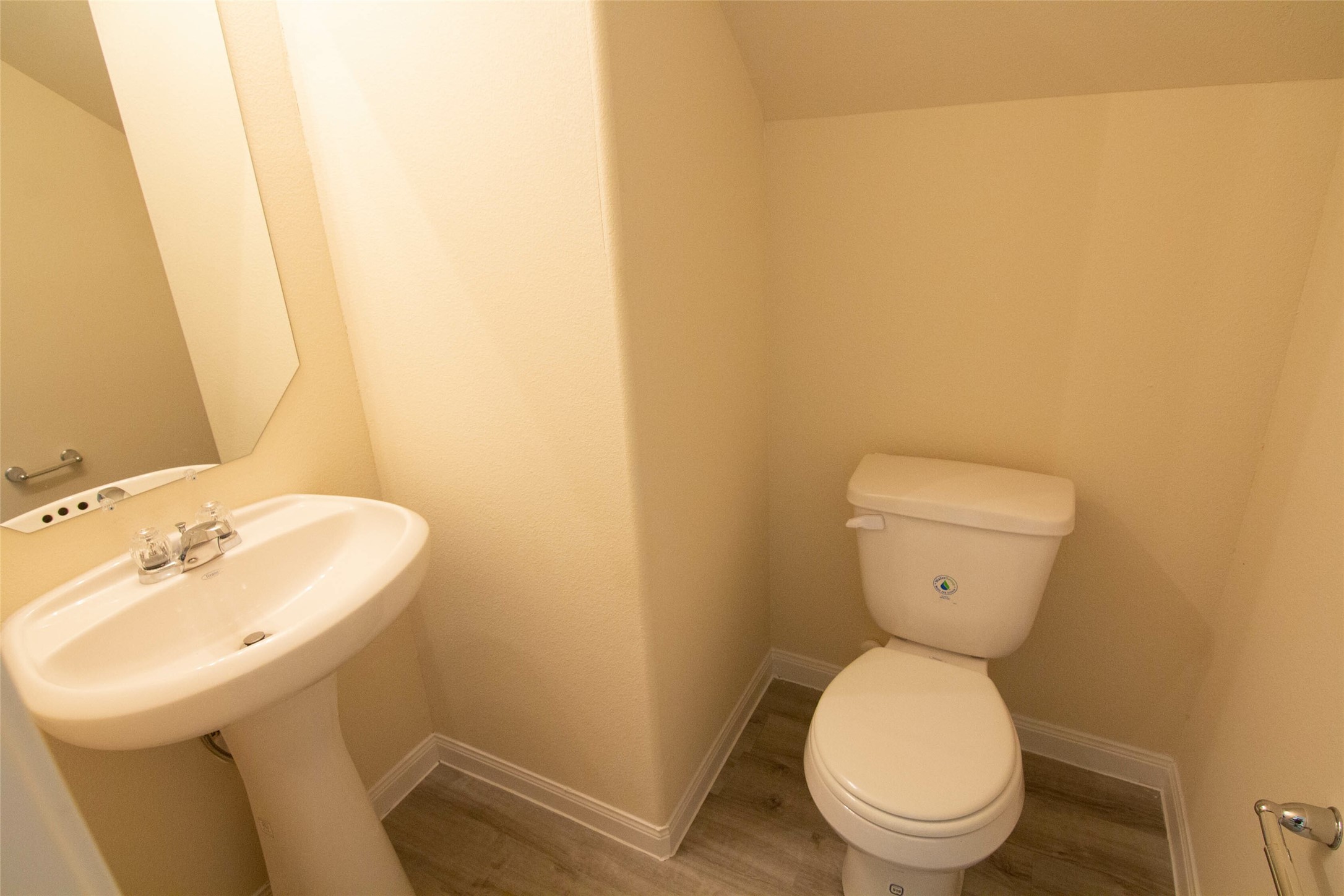 12738 Veterans Silver Road Houston, TX 77014 - Photo 8 of 12 a bathroom with a sink and a toilet