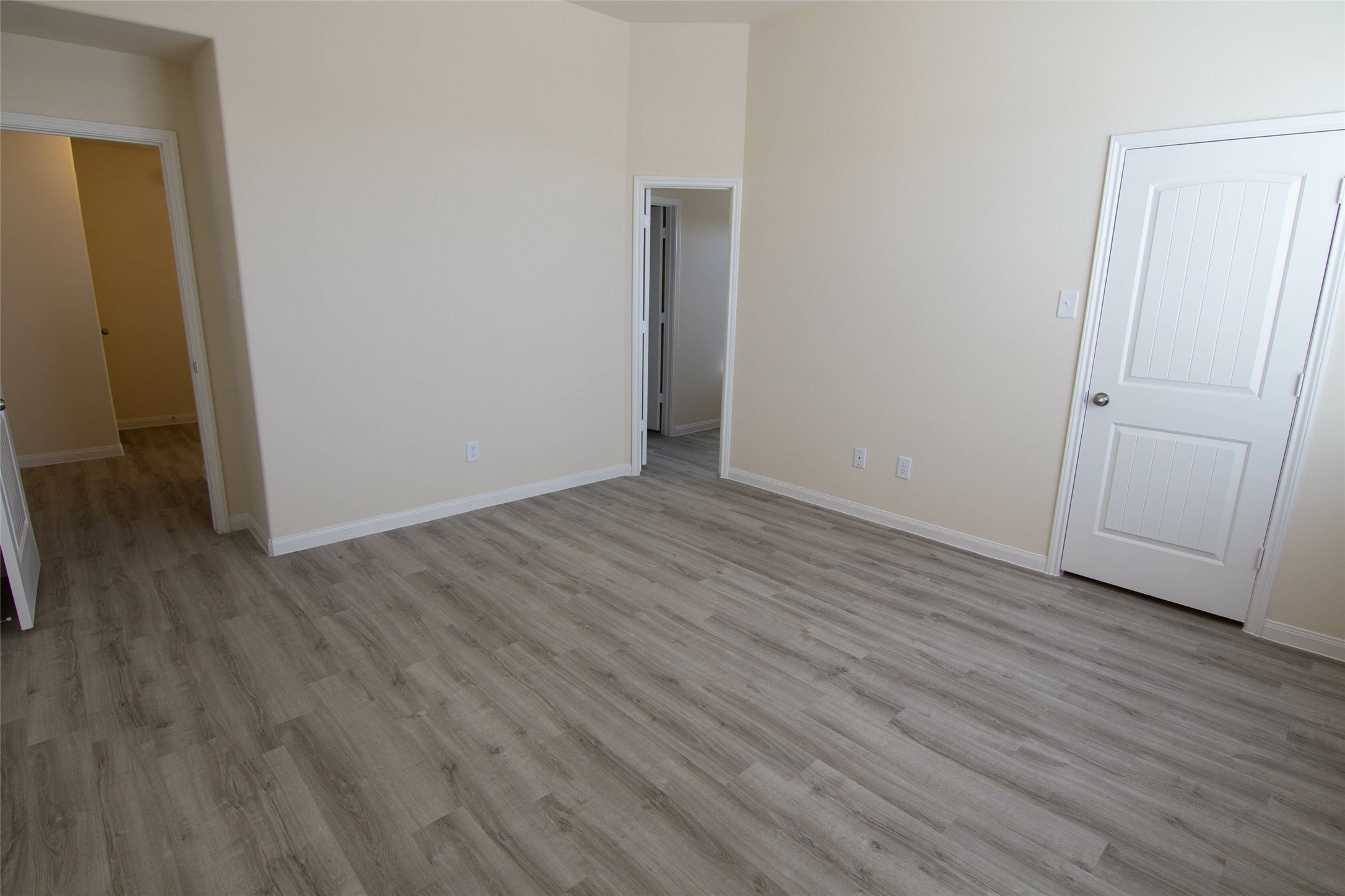 12738 Veterans Silver Road Houston, TX 77014 - Photo 9 of 12 an empty room with wooden floor and closet