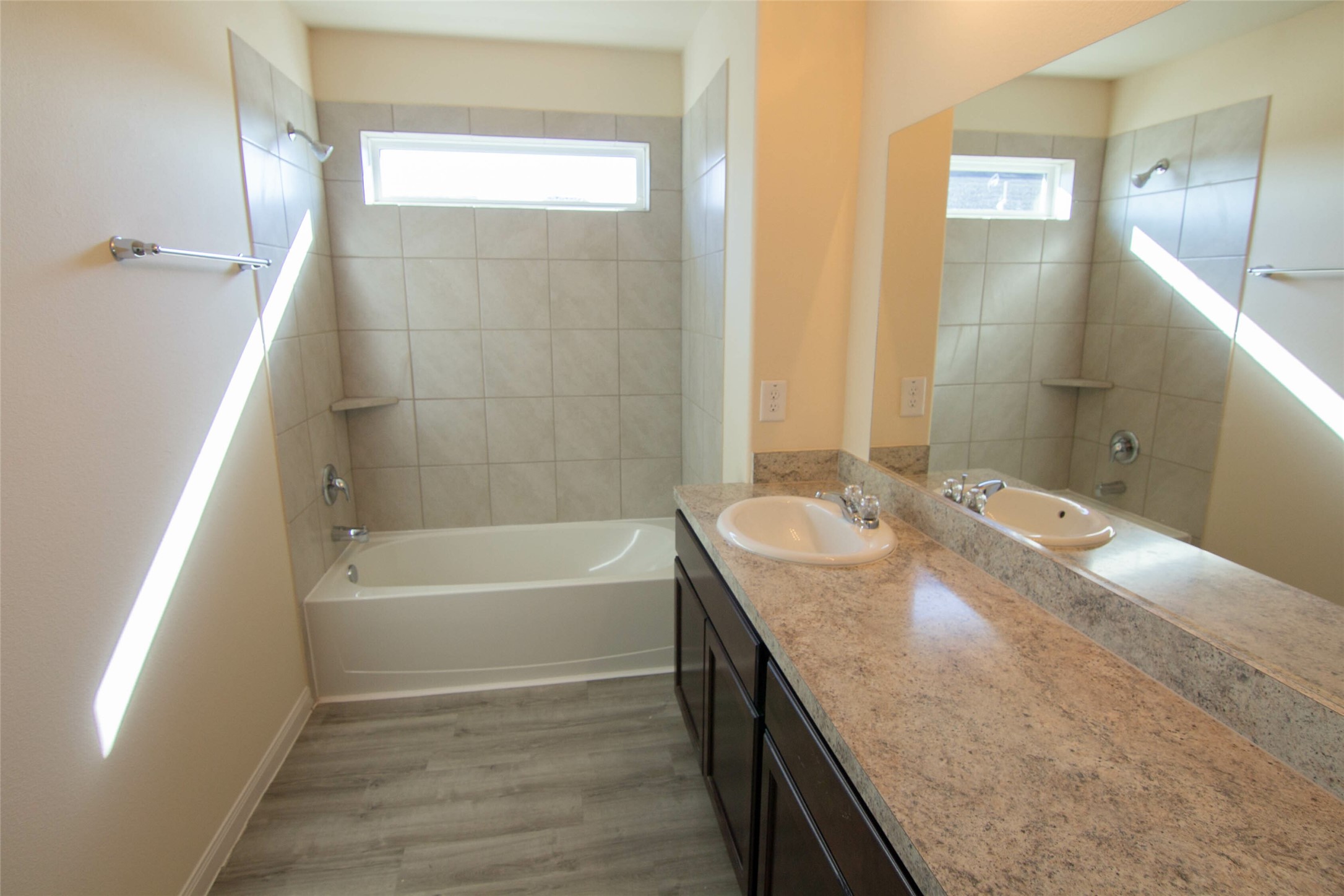 12738 Veterans Silver Road Houston, TX 77014 - Photo 10 of 12 a bathroom with a granite countertop sink a toilet and shower
