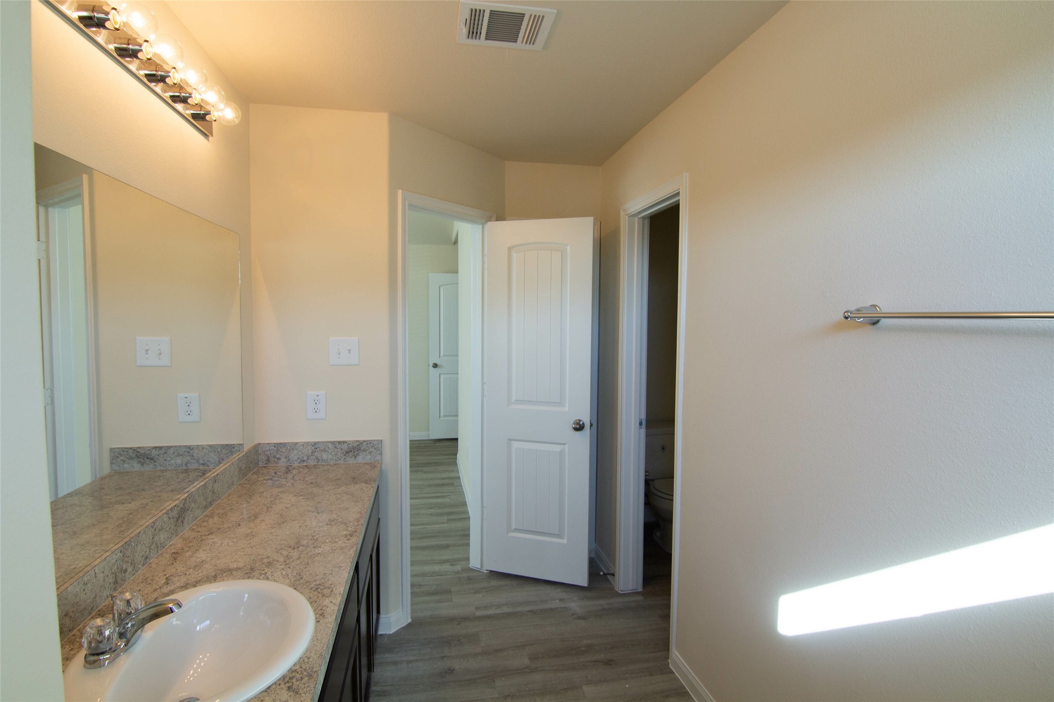12738 Veterans Silver Road Houston, TX 77014 - Photo 11 of 12 a bathroom with a sink and a mirror
