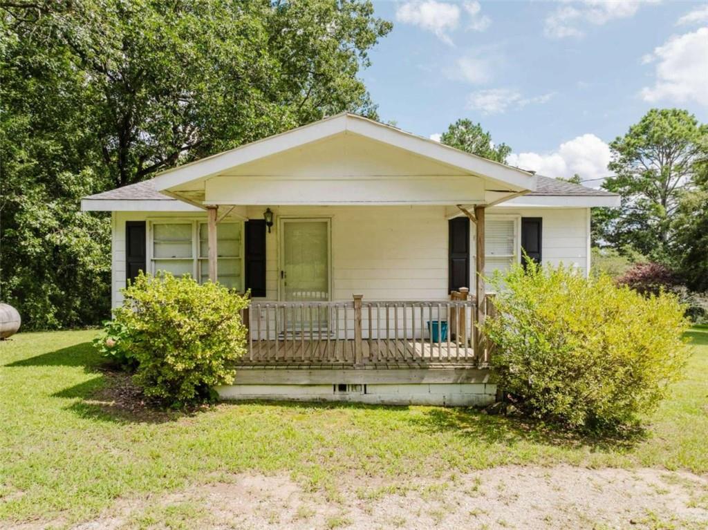 1352 Collard Valley Road Cedartown, GA 30125 - Photo 1 of 1 a front view of a house with garden