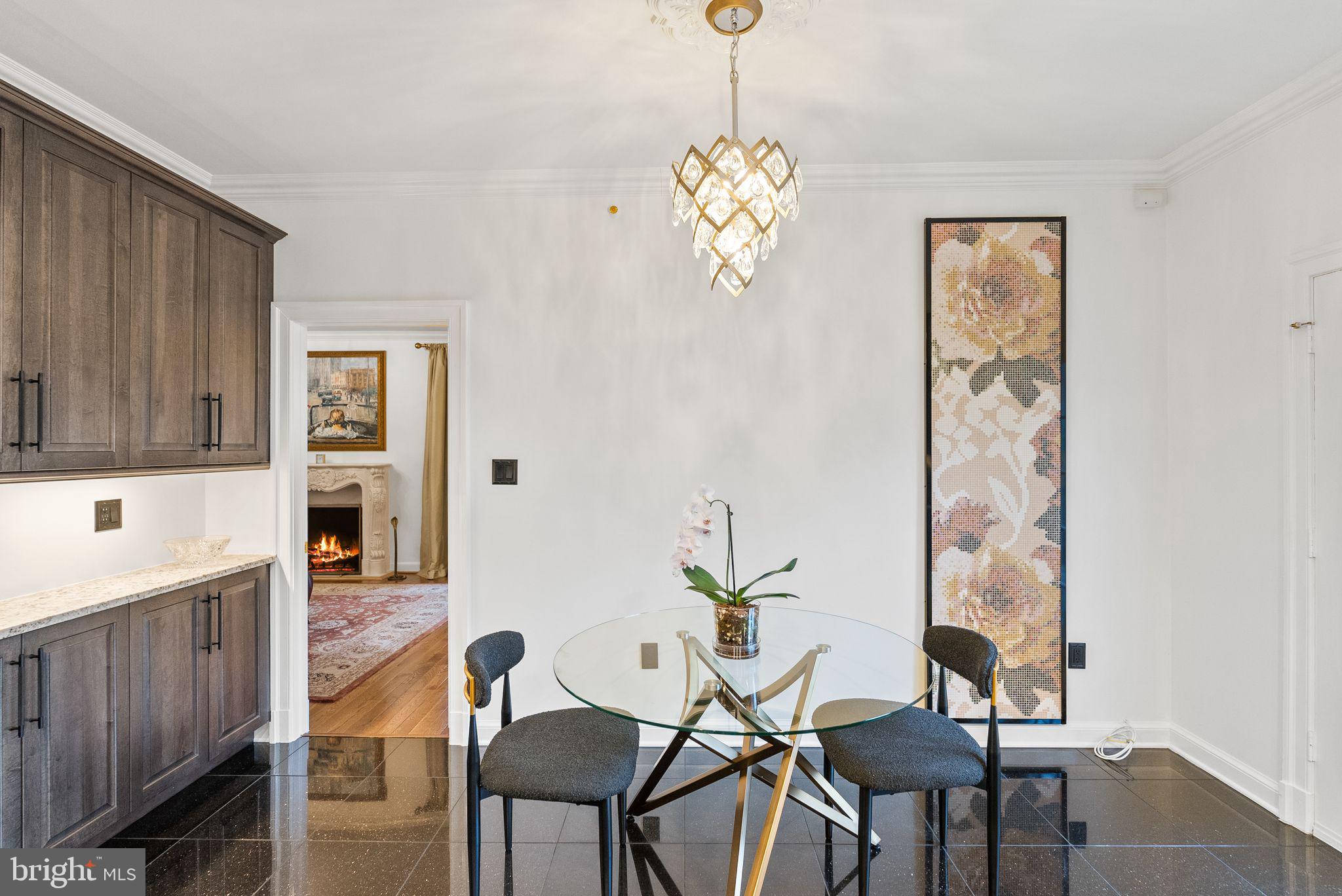 4613 Charleston Terrace Northwest Washington, DC 20007 - Photo 28 of 114 a view of a dining room with furniture and chandelier