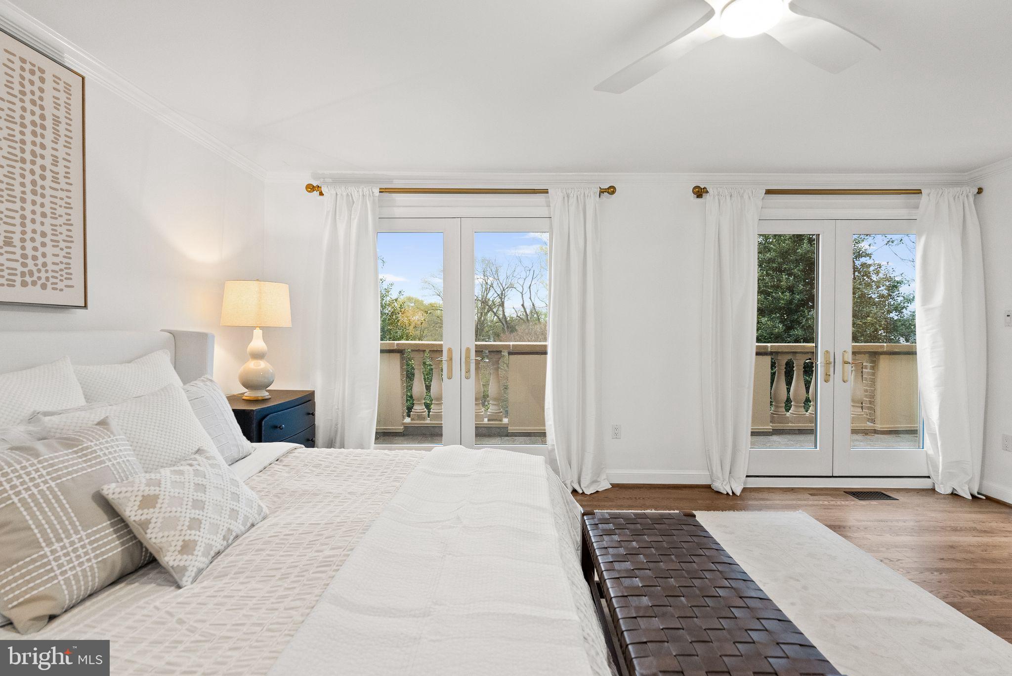 4613 Charleston Terrace Northwest Washington, DC 20007 - Photo 41 of 114 a bedroom with a large bed and a large window