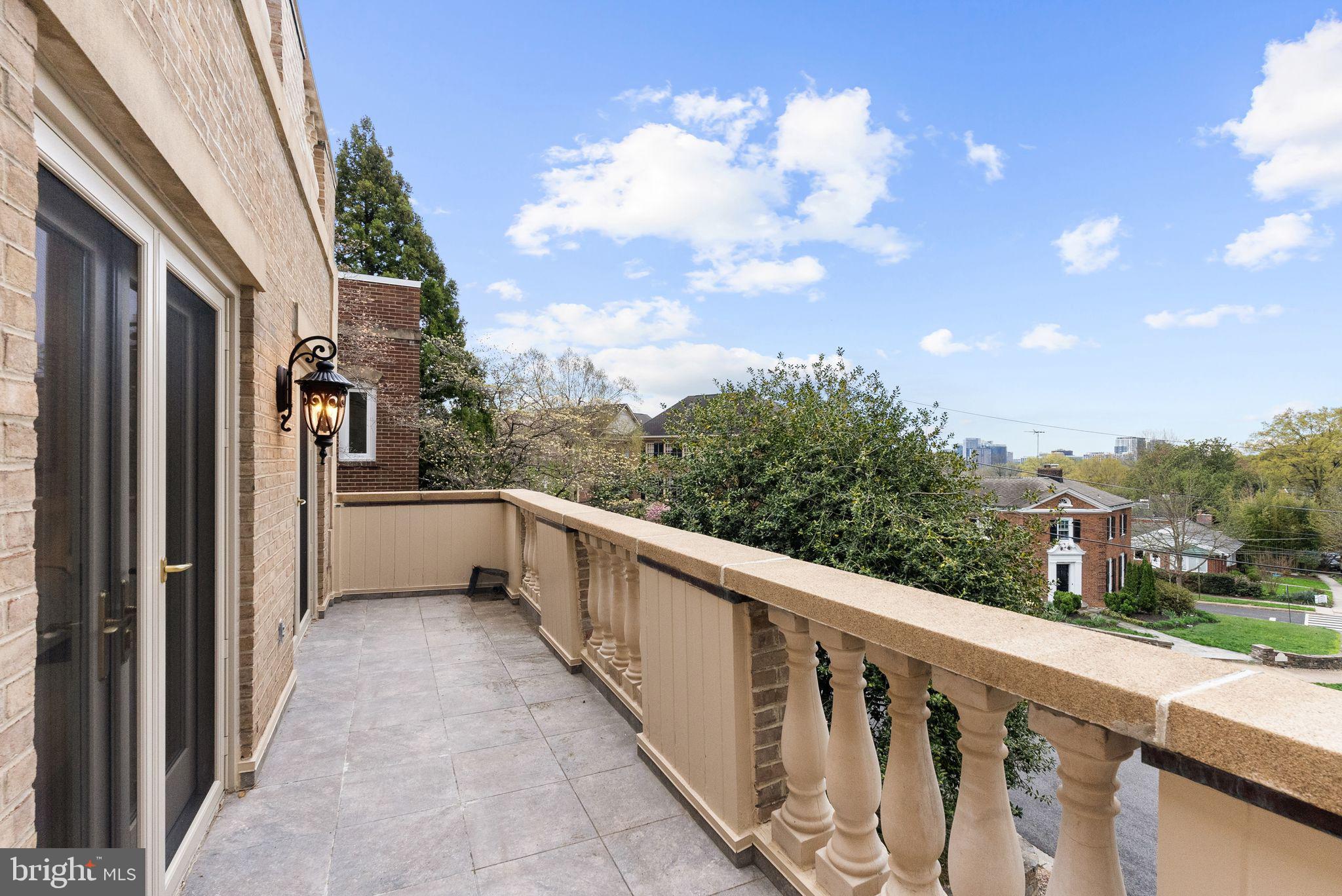 4613 Charleston Terrace Northwest Washington, DC 20007 - Photo 48 of 114 a view of a balcony with wooden fence
