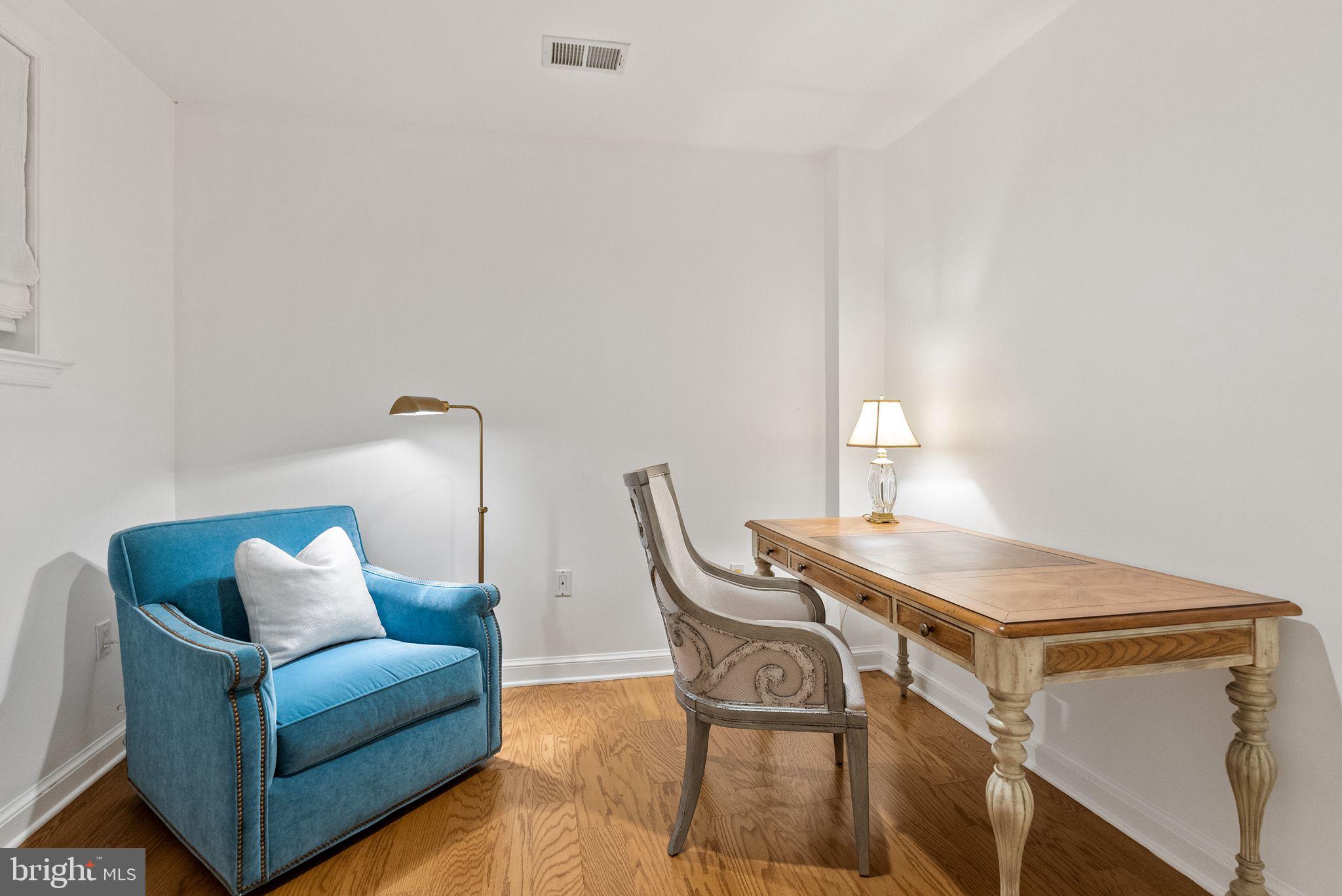 4613 Charleston Terrace Northwest Washington, DC 20007 - Photo 73 of 114 a living room with furniture and a table