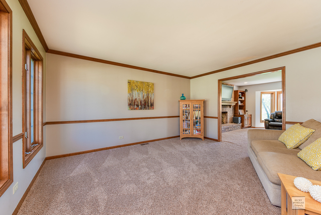 1812 Denison Road Naperville, IL 60565 - Photo 4 of 33 a view of a livingroom with furniture and a window