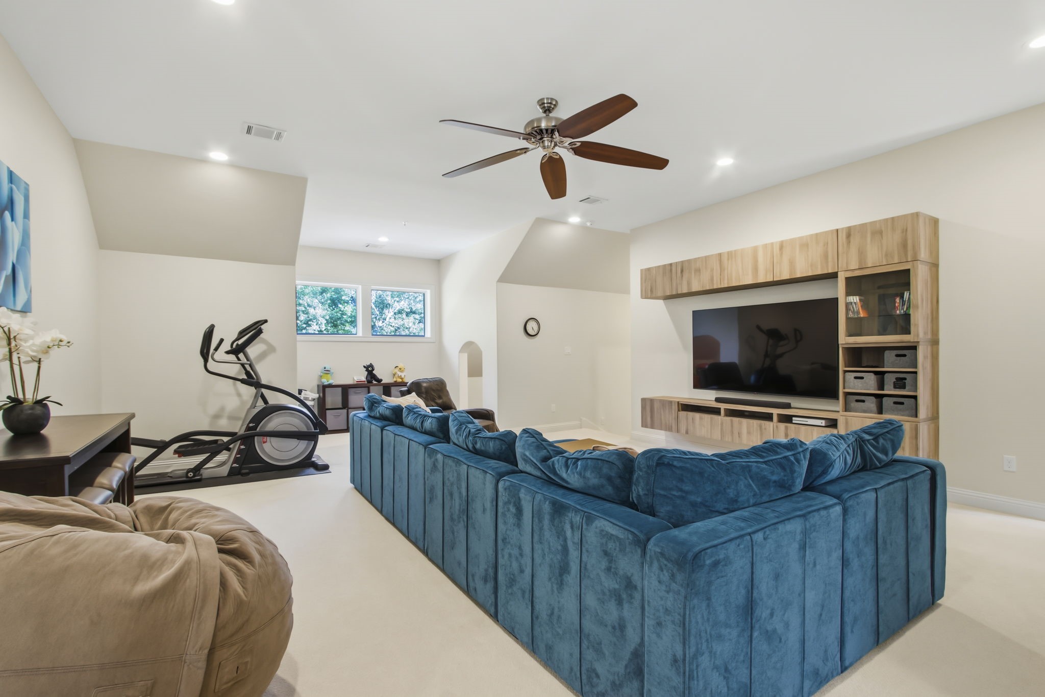 36702 Deer Valley Magnolia, TX 77355 - Photo 28 of 46 a living room with furniture and a flat screen tv