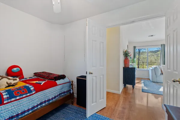 a view of a kitchen cabinets and wooden floor