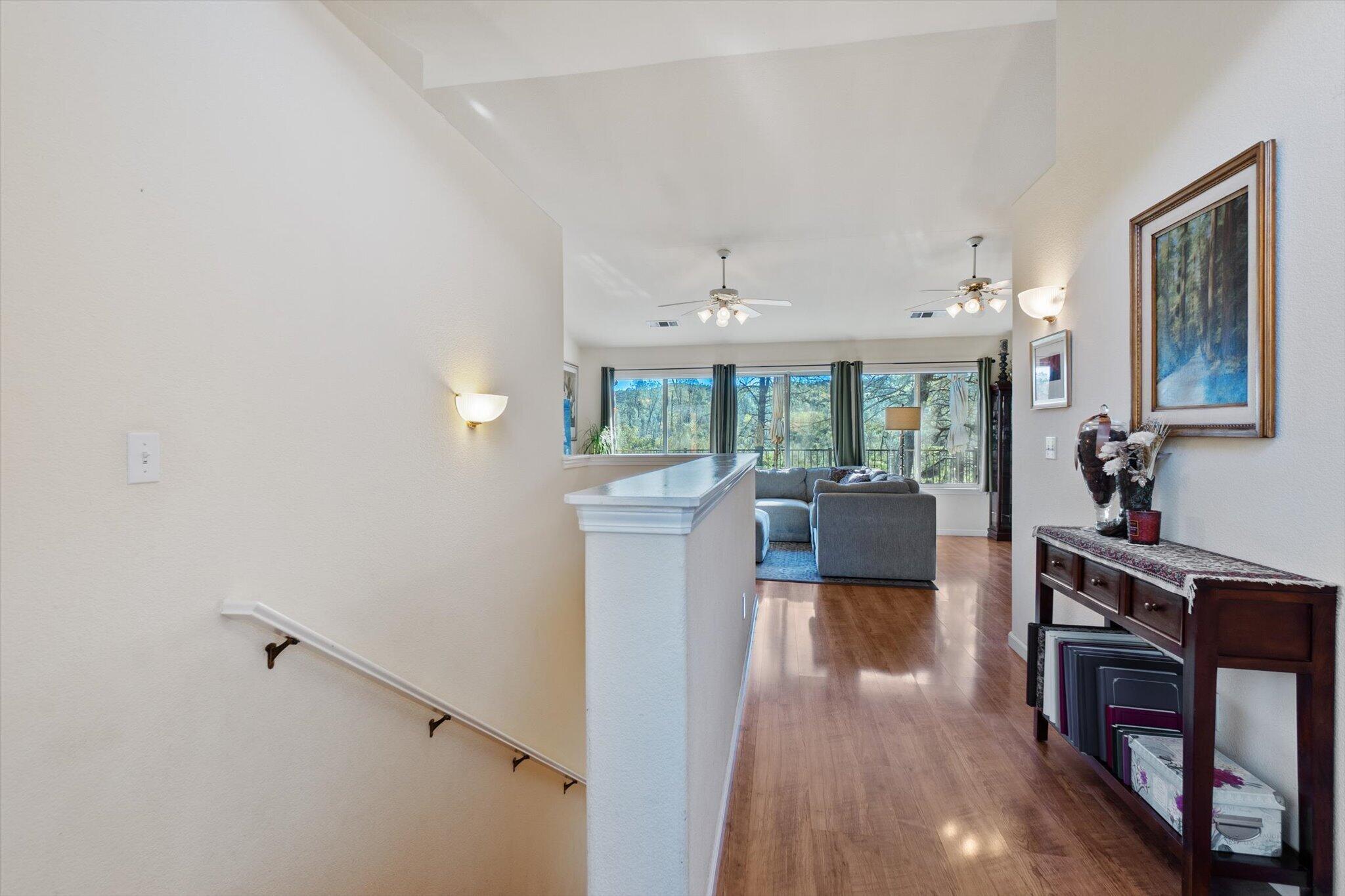 10067 Tilton Mine Road Redding, CA 96001 - Photo 21 of 62 a view of a living room with furniture and a large window