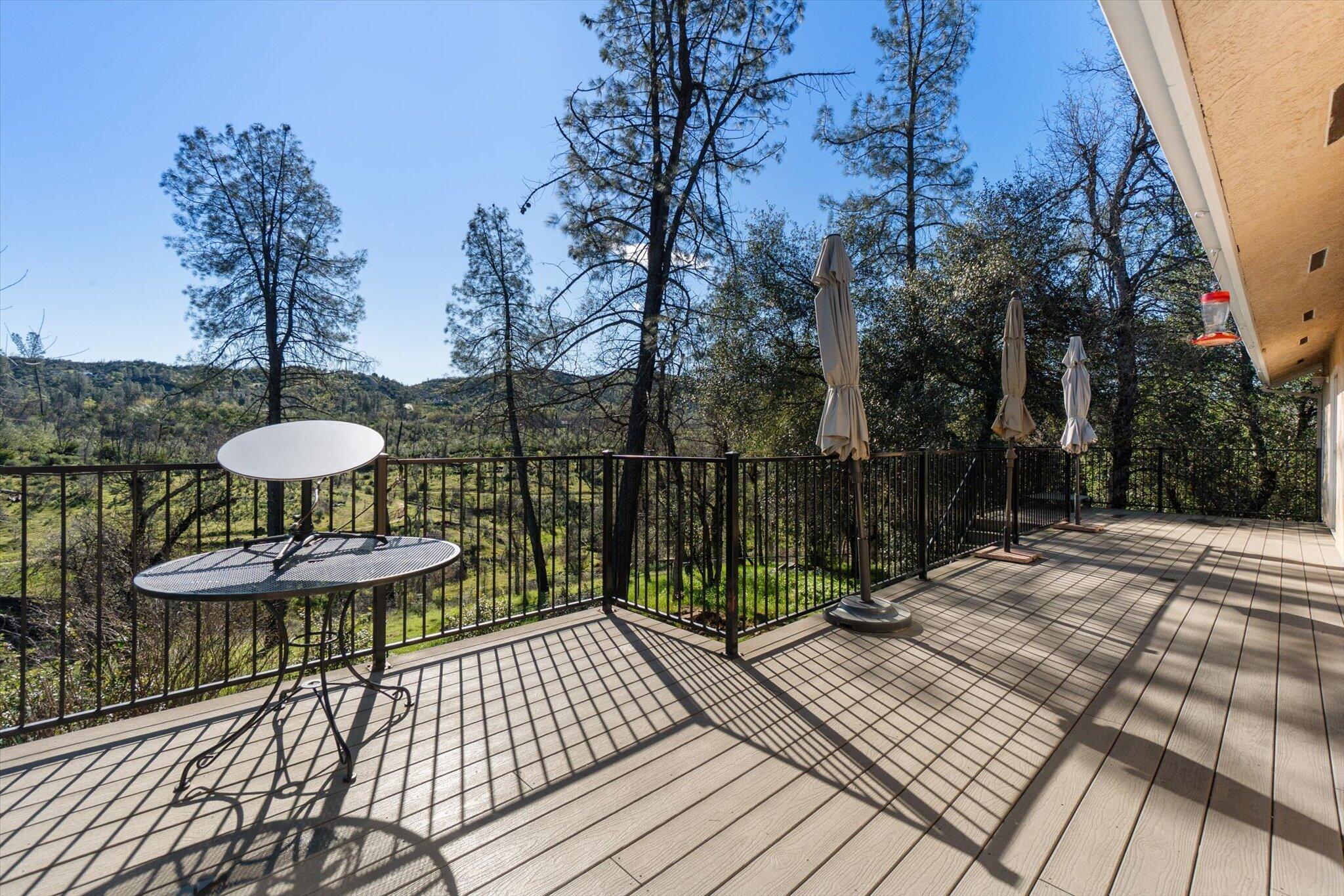 10067 Tilton Mine Road Redding, CA 96001 - Photo 34 of 62 a view of a chairs and tables on the roof deck