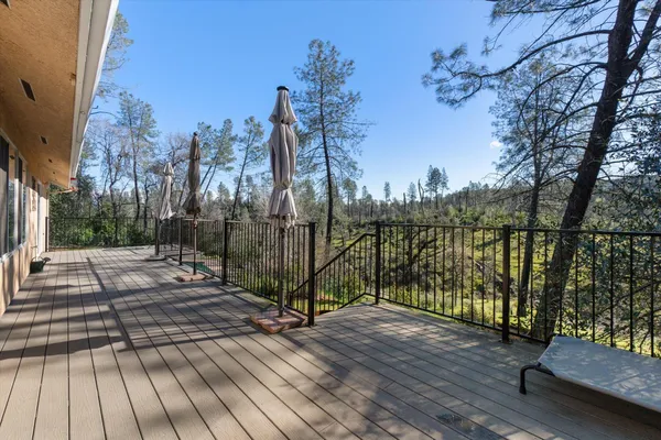 a view of a house with outdoor space and garden