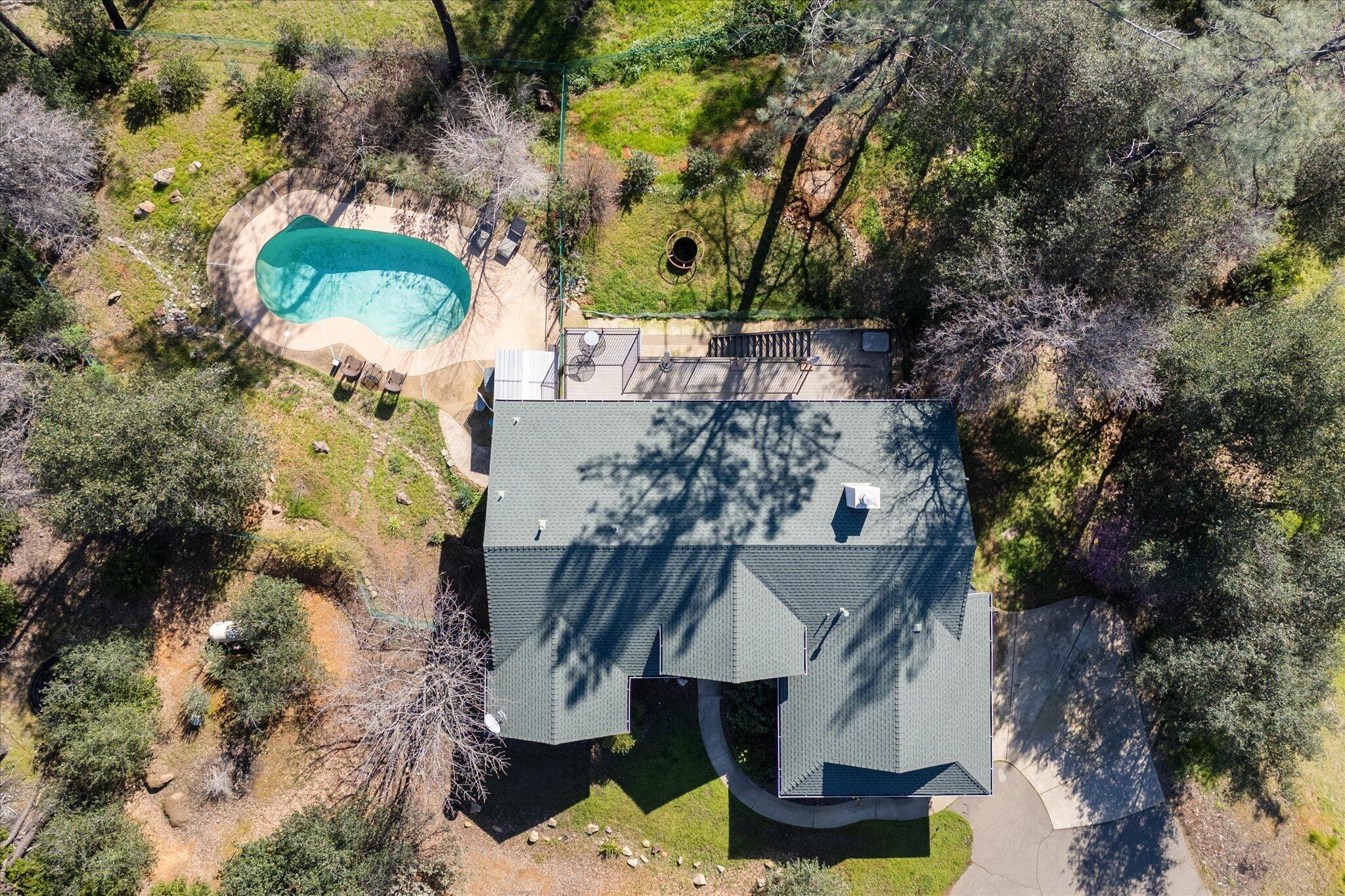 10067 Tilton Mine Road Redding, CA 96001 - Photo 50 of 62 an aerial view of a house with a yard