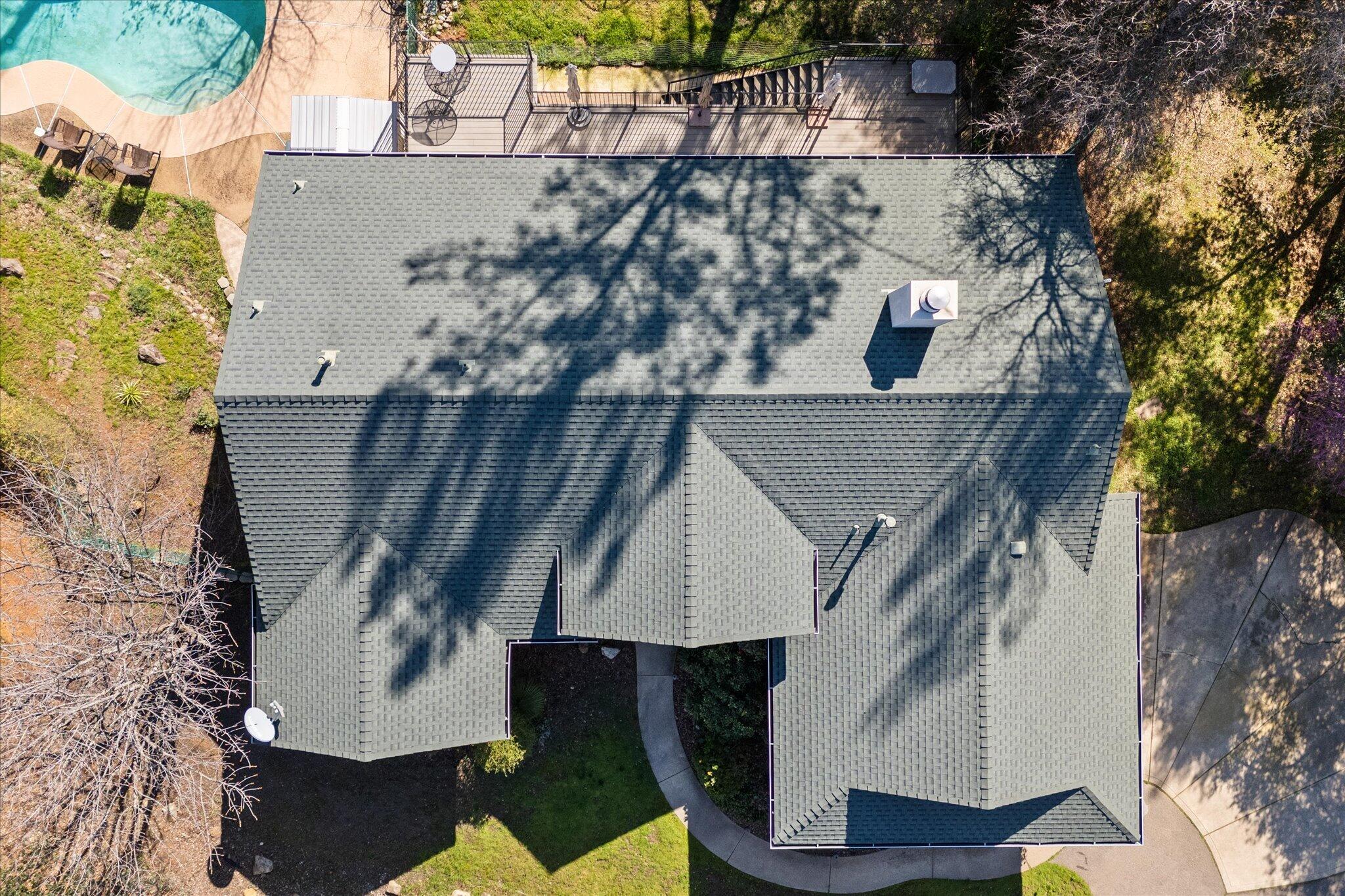 10067 Tilton Mine Road Redding, CA 96001 - Photo 62 of 62 an aerial view of a house with yard and swimming pool