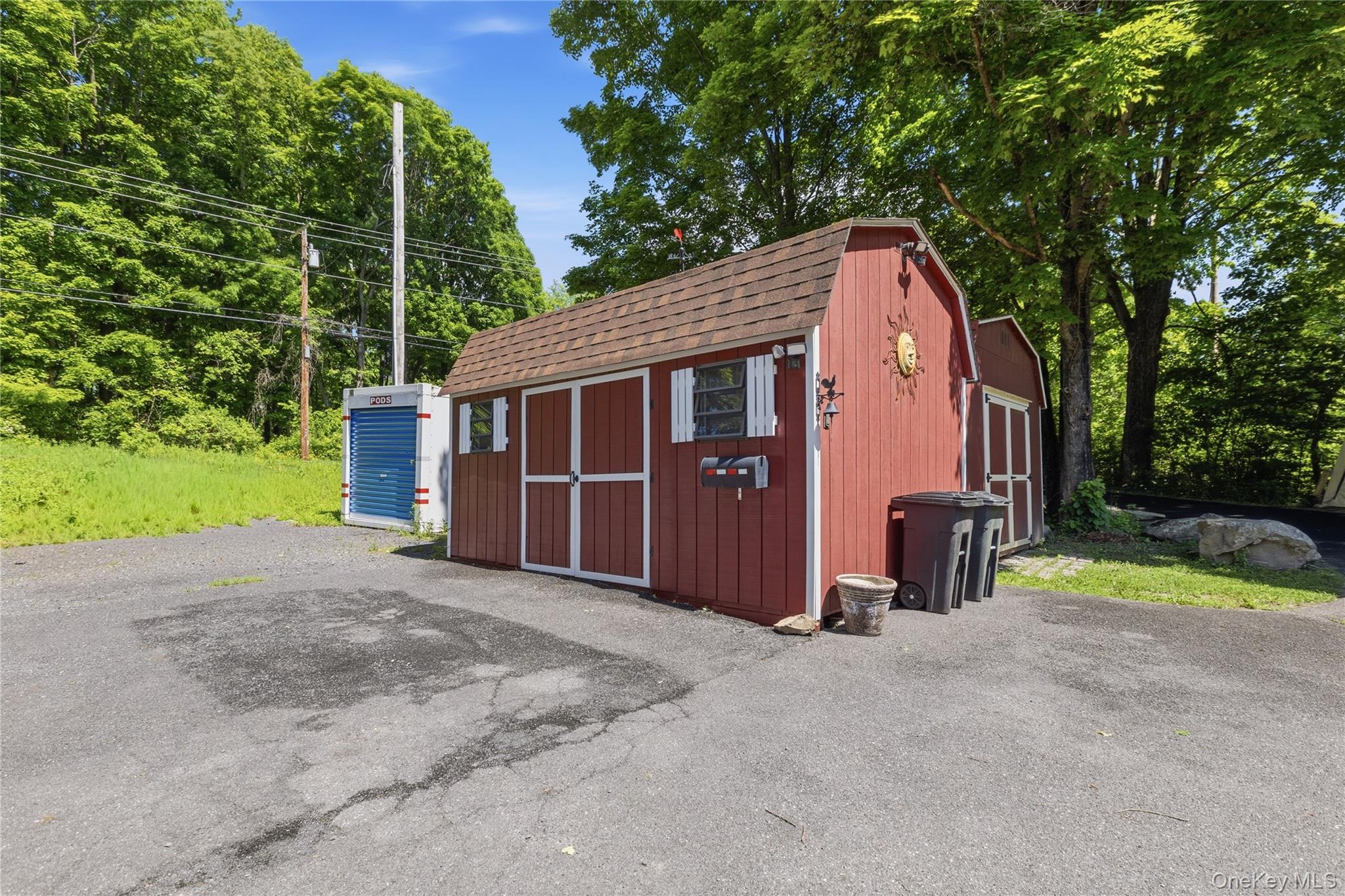 239-241 Fosler Road Highland, NY 12528 - Photo 26 of 42 Red-sided shed with a gambrel roof and double doors