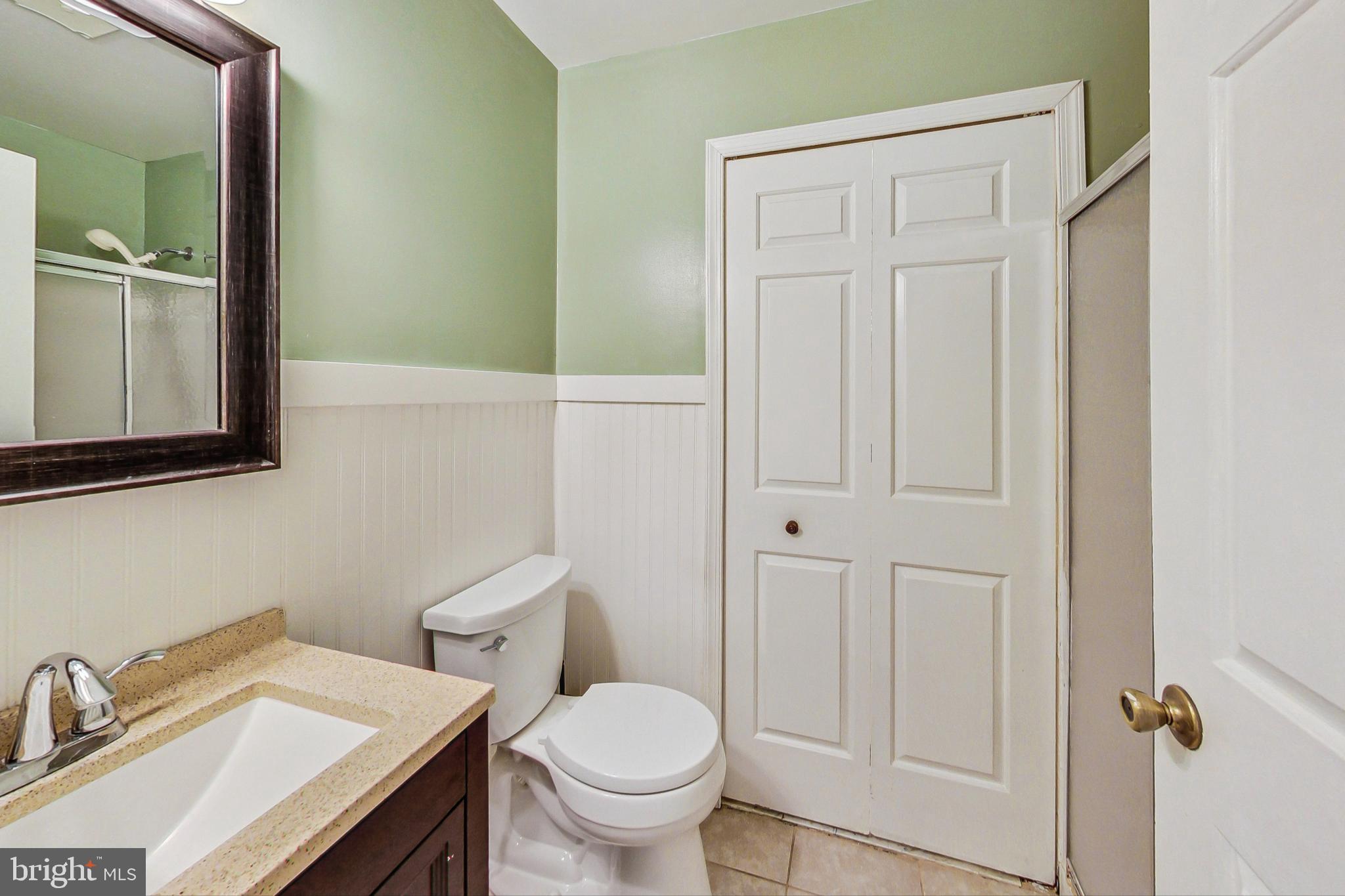 3445 Williamsburg Drive Waldorf, MD 20601 - Photo 26 of 49 Main Floor Full Bathroom leading Laundry/Storage