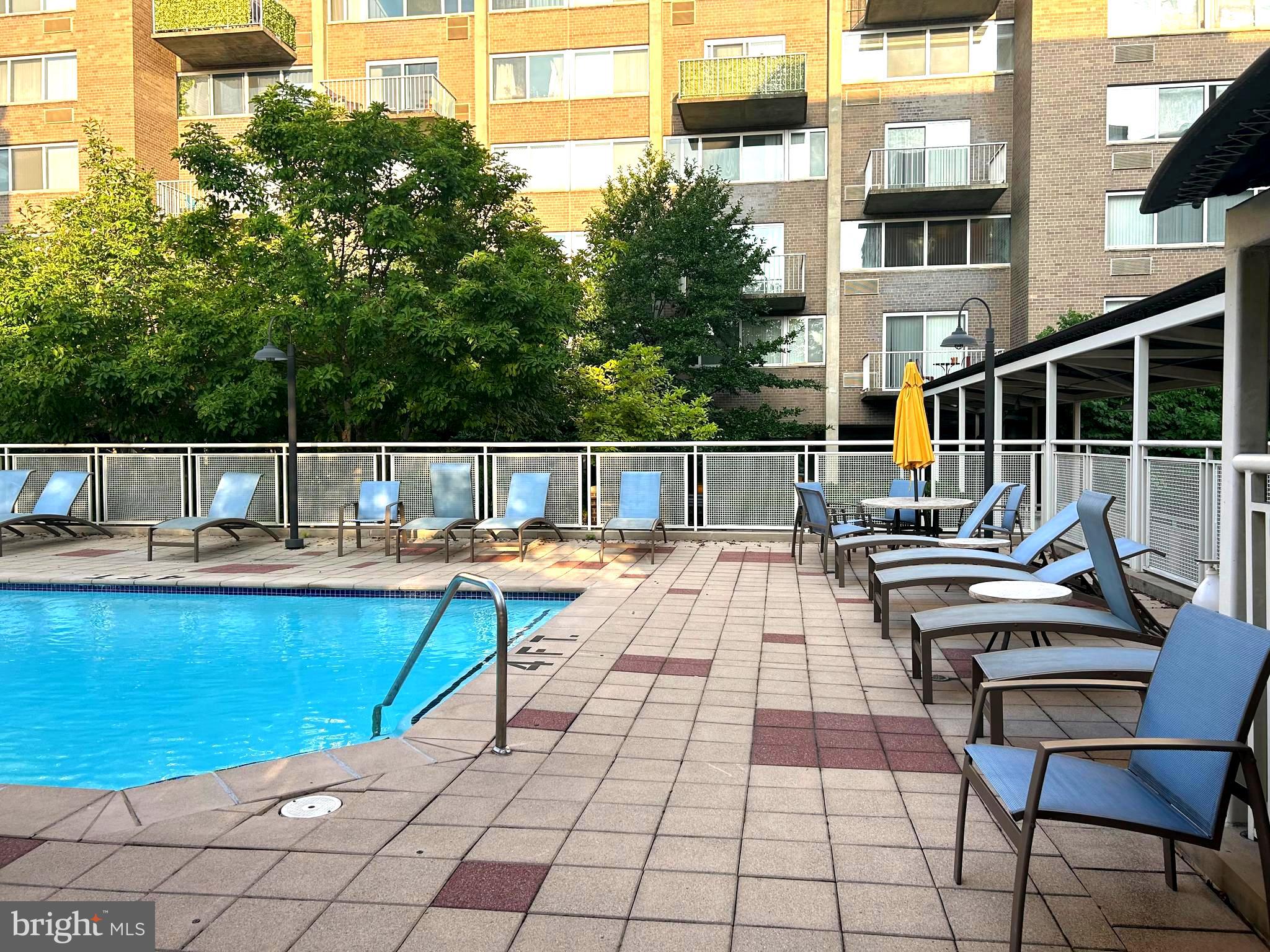 800 4th Street Southwest, Unit S721 Washington, DC 20024 - Photo 38 of 39 a view of house with swimming pool outdoor seating