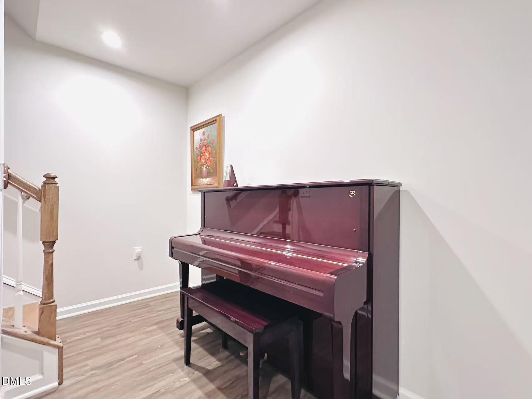 4740 Randall Road Durham, NC 27707 - Photo 21 of 29 a view of entryway with wooden floor