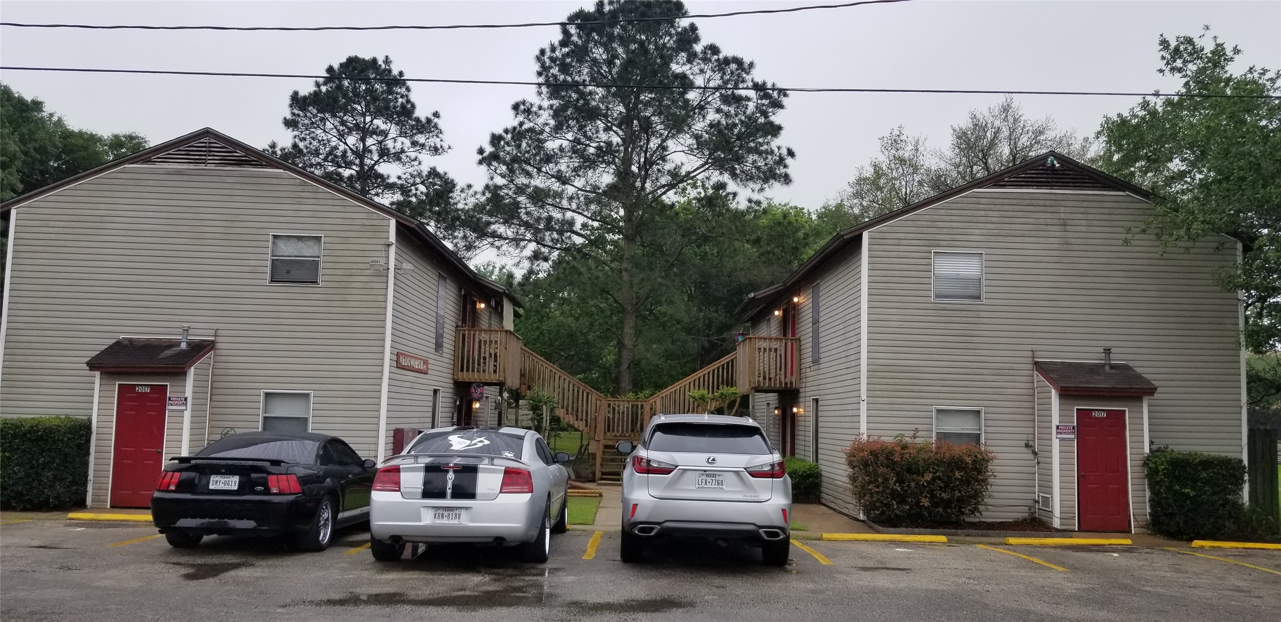 a view of a car in front of house