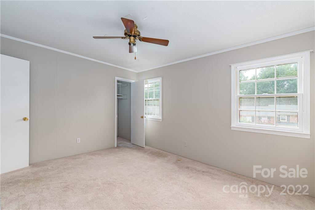 623 South New Hope Road, Unit 21 Gastonia, NC 28054 - Photo 17 of 18 a view of room with ceiling fan and window