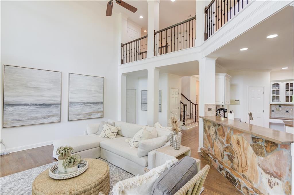 2870 Roanoke Road Cumming, GA 30041 - Photo 17 of 94 a living room with furniture and wooden floor