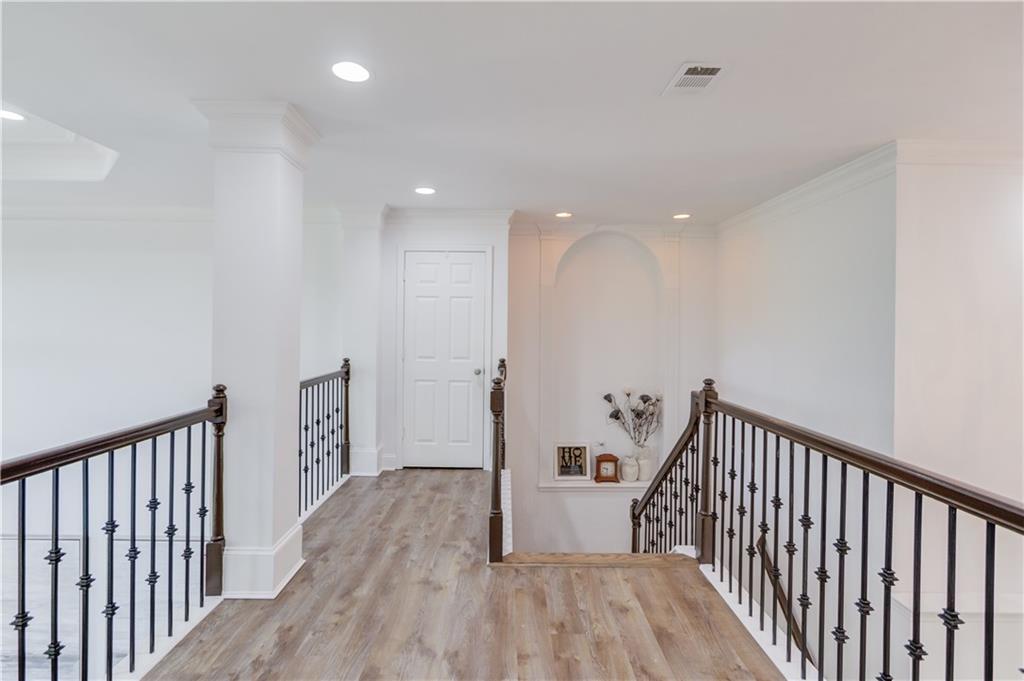 2870 Roanoke Road Cumming, GA 30041 - Photo 41 of 94 a view of a hallway with wooden floor