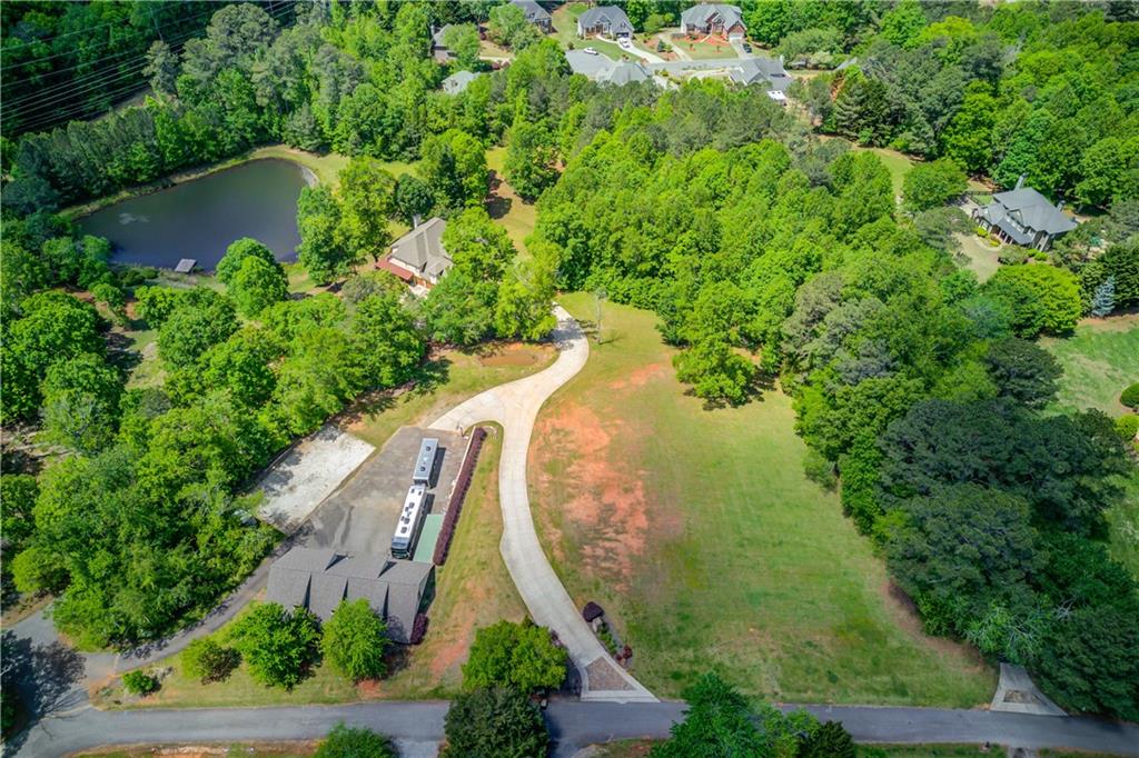 2870 Roanoke Road Cumming, GA 30041 - Photo 7 of 94 an aerial view of a house with outdoor space and street view