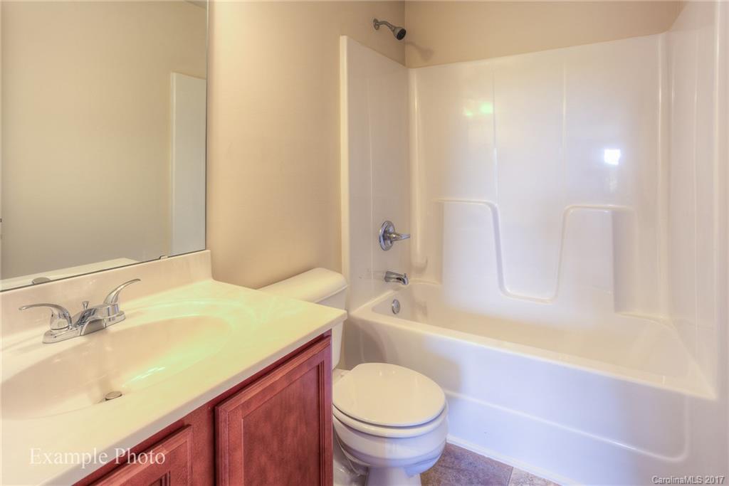 2132 Gunnars Ridge Road, Unit 43 Lancaster, SC 29720 - Photo 19 of 24 a bathroom with a sink and a mirror