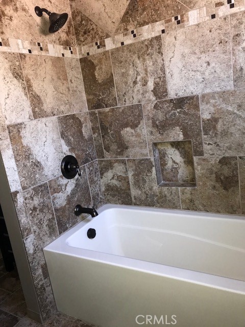 300 Bethany Road, Unit G Burbank, CA 91504 - Photo 8 of 9 a bathroom with a bathtub