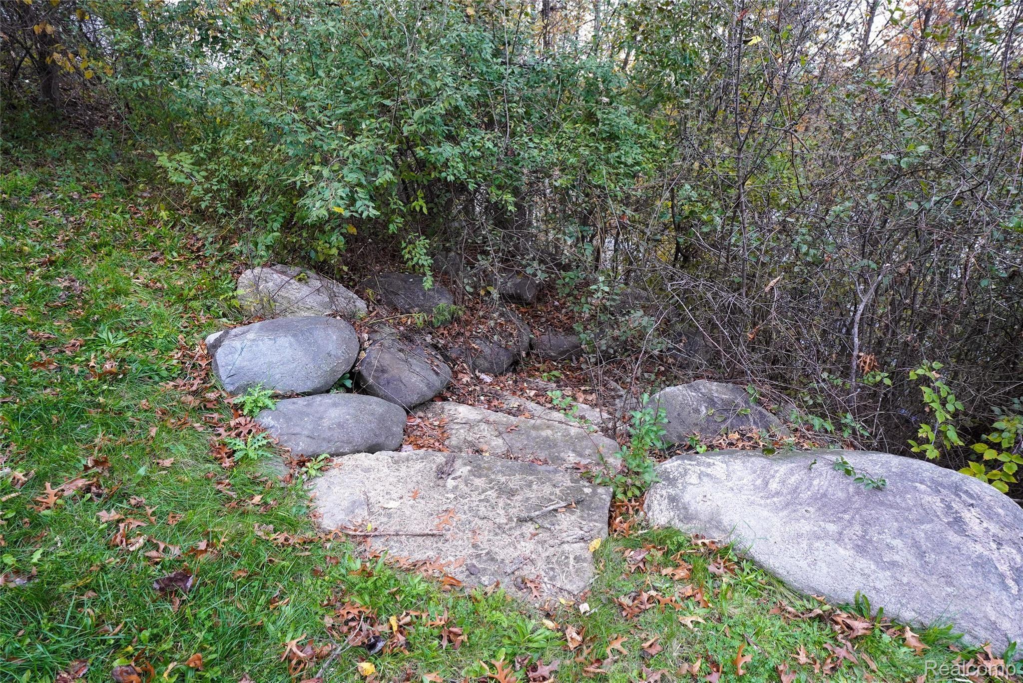 603 East Davisburg Road Holly, MI 48442 - Photo 13 of 29 Stone Wall by Pond!