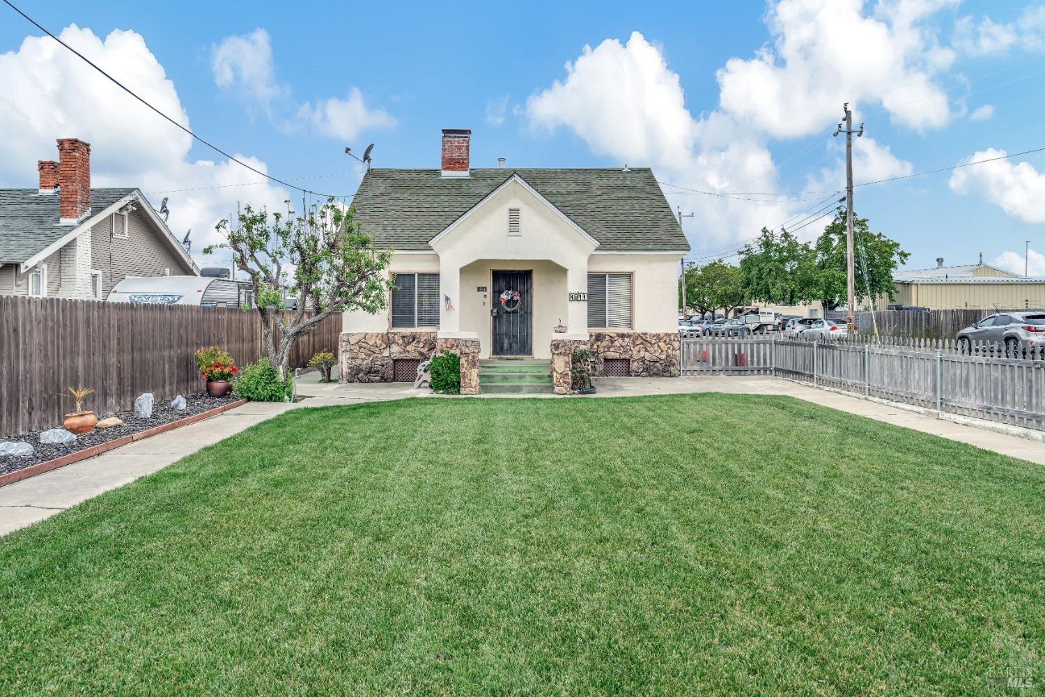 1911 Broadway Vallejo, CA 94589 - Photo 1 of 1 a front view of a house with garden