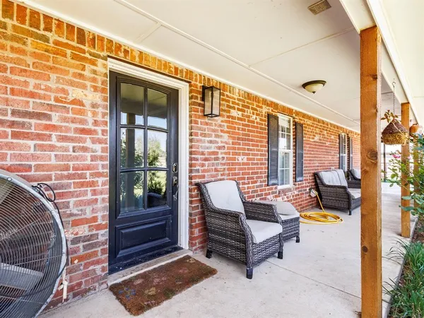 a building outdoor space with patio furniture