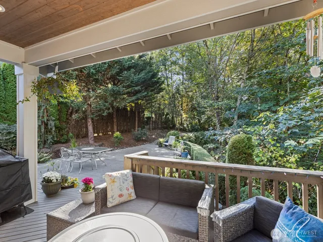 a outdoor space with patio the couches and a dining table with the potted plant