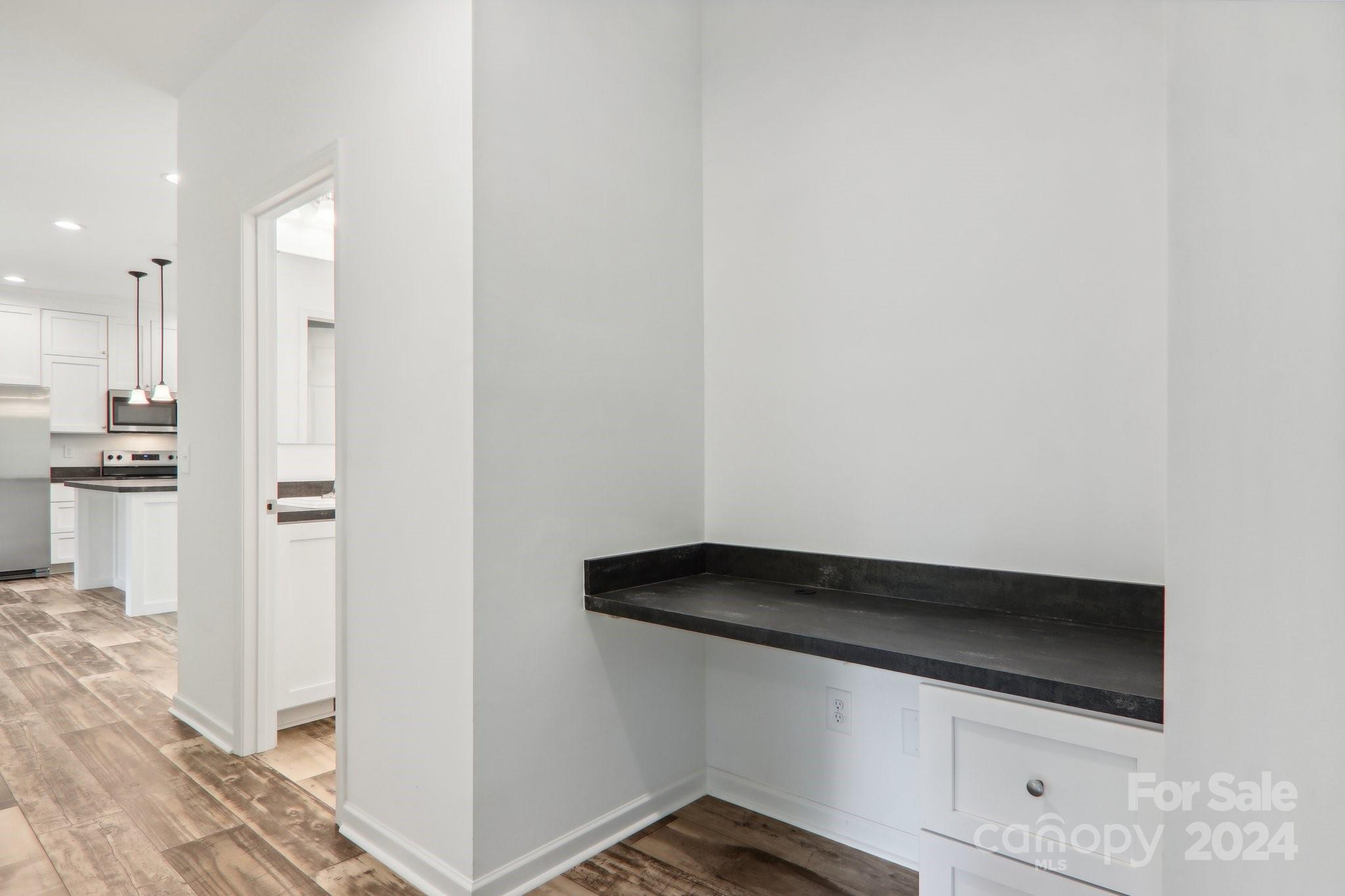 1730 Windswept Ridge Road Marshall, NC 28753 - Photo 29 of 45 a view of walk in closet with empty racks