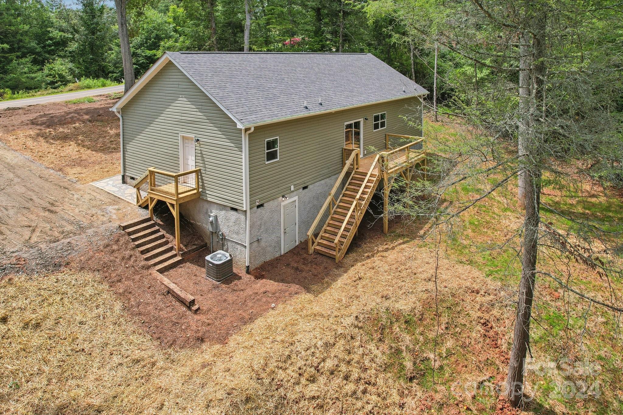 1730 Windswept Ridge Road Marshall, NC 28753 - Photo 45 of 45 a view of a house with a yard