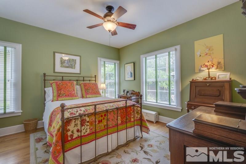 600 Gordon Avenue Reno, NV 89509 - Photo 17 of 25 a bedroom with a bed and a chandelier