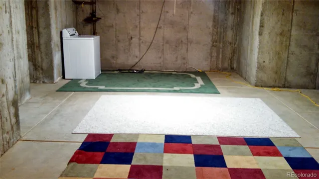 a view of a patio with furniture and garden