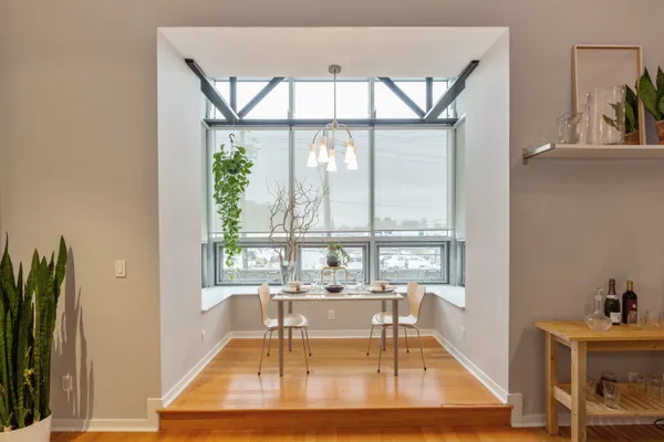 a view of a living room and dining room